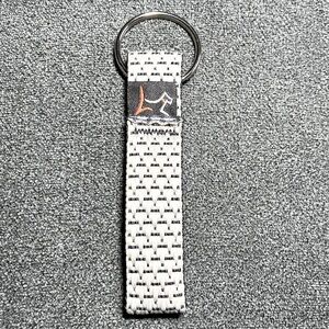 New gray and black keychain - loop at end NWOT